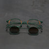 Rigards x ZIGGY CHEN RG1943ZC Titanium Magnetic Clip-On Sunglasses. RG-RG1943ZC-BLQTKTMQTL. Dark green bronze frame with dark green frame, transparent lenses, and bronze blue lenses.